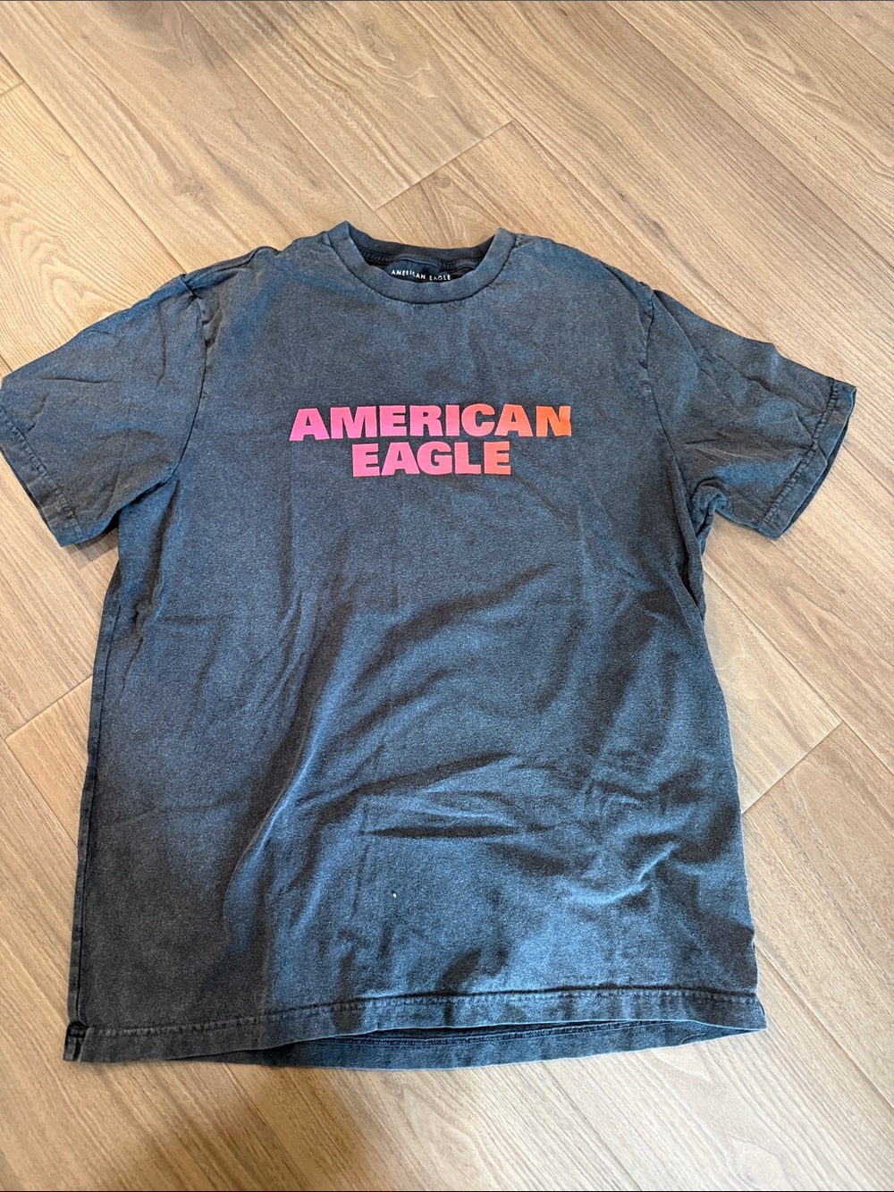 American Eagle Outfitters Black Tee with Pink and Orange Logo